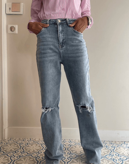 Jeans évasé bleu femme avec déchirures et effet délavé